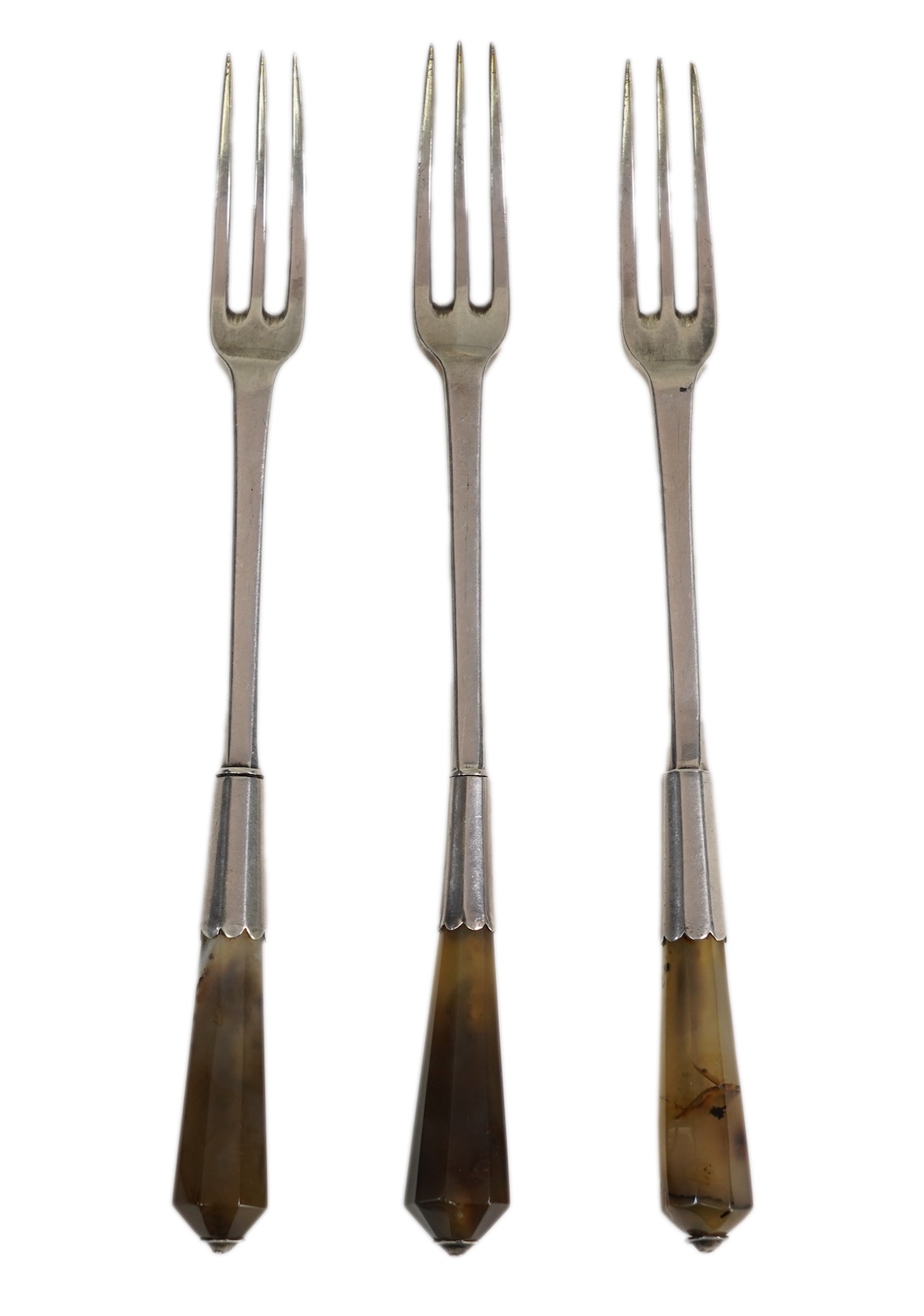 A set of three late Charles II agate handled silver three pronged forks, maker TZ with crown above and mullet below, (Jackson's ref. p.139)